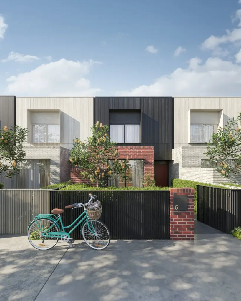 Modern townhouse with bicycle and black fence