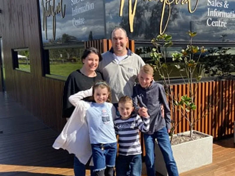 Family of five outside sales centre
