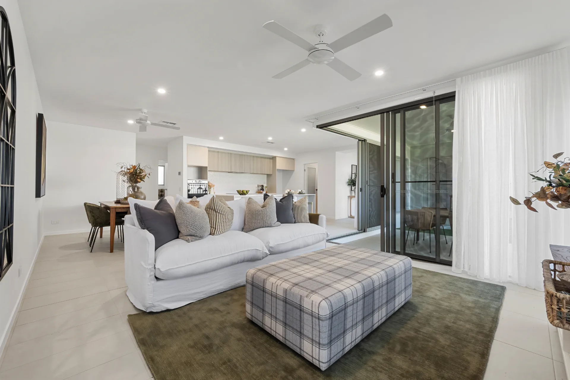 Modern open-plan living room with patio access
