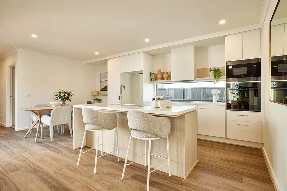 Modern open-plan kitchen with island and dining area