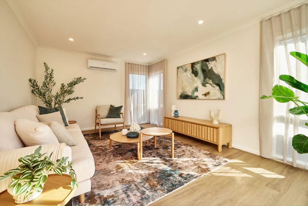 Bright modern living room with wooden furniture and plants