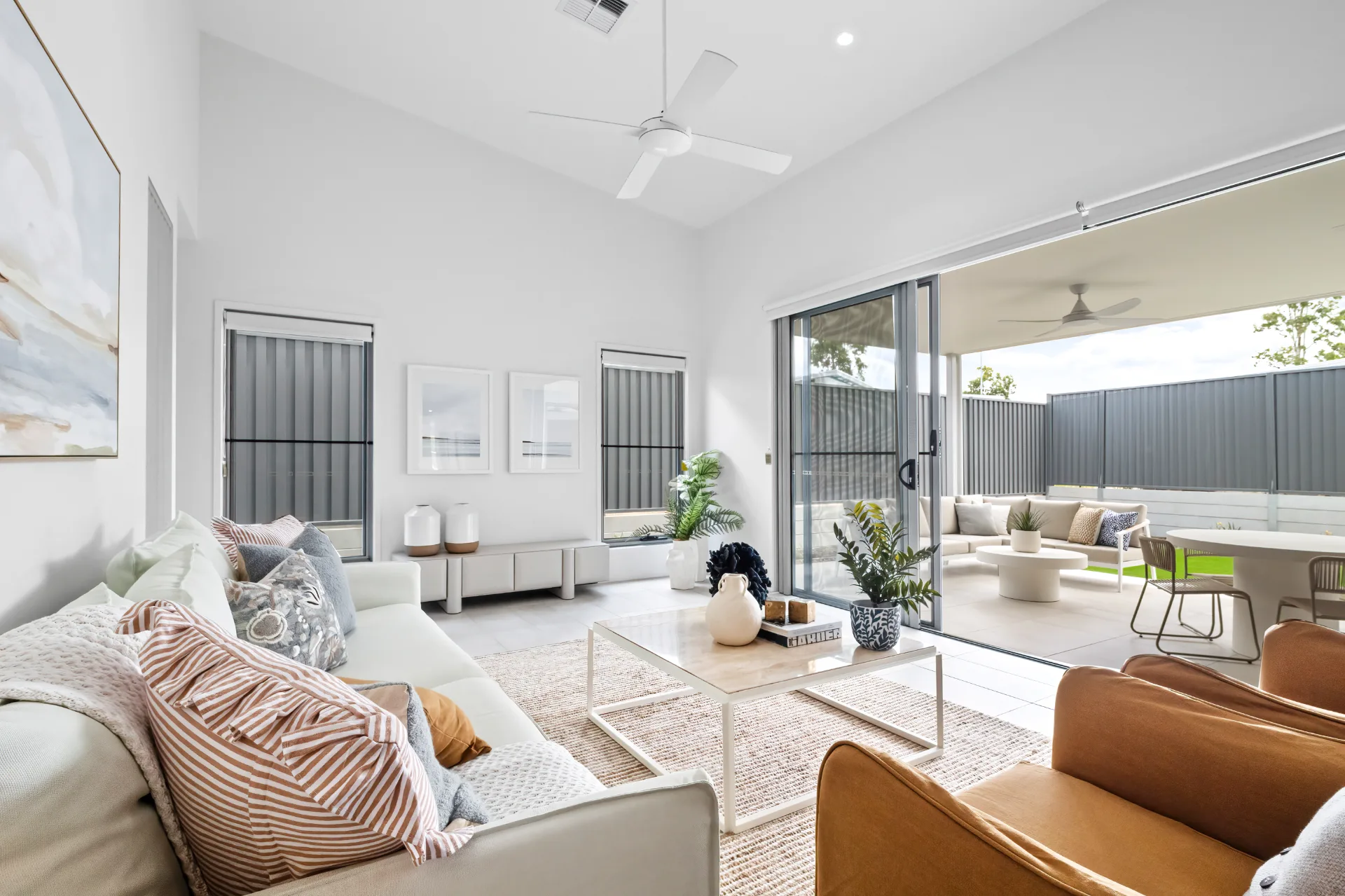 Modern living room opening to outdoor patio area